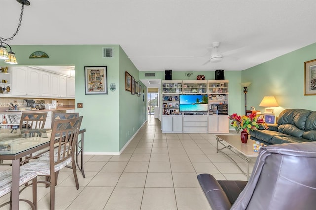 3003 Lyndhurst H Unit 3003, Deerfield Beach, FL 33442 - living room featuring a ceiling fan and light tile patterned flooring