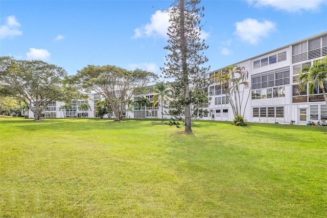 3003 Lyndhurst H Unit 3003, Deerfield Beach, FL 33442 - view of home's community with a yard