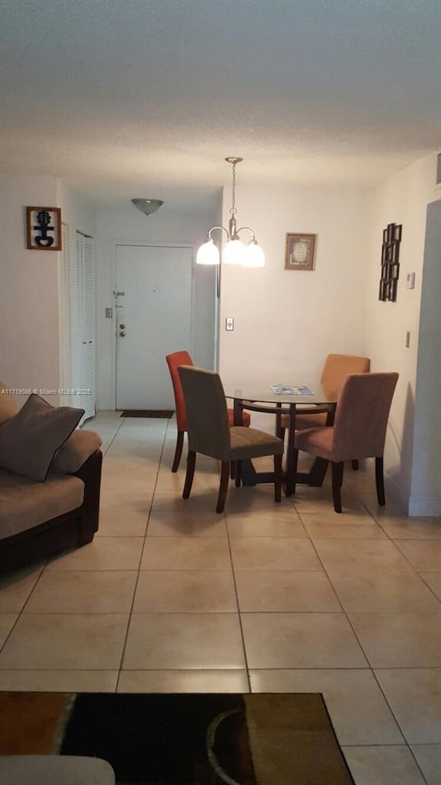 dining room featuring light tile patterned floors