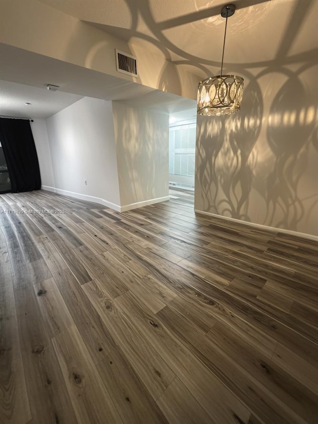 unfurnished dining area with dark hardwood / wood-style floors