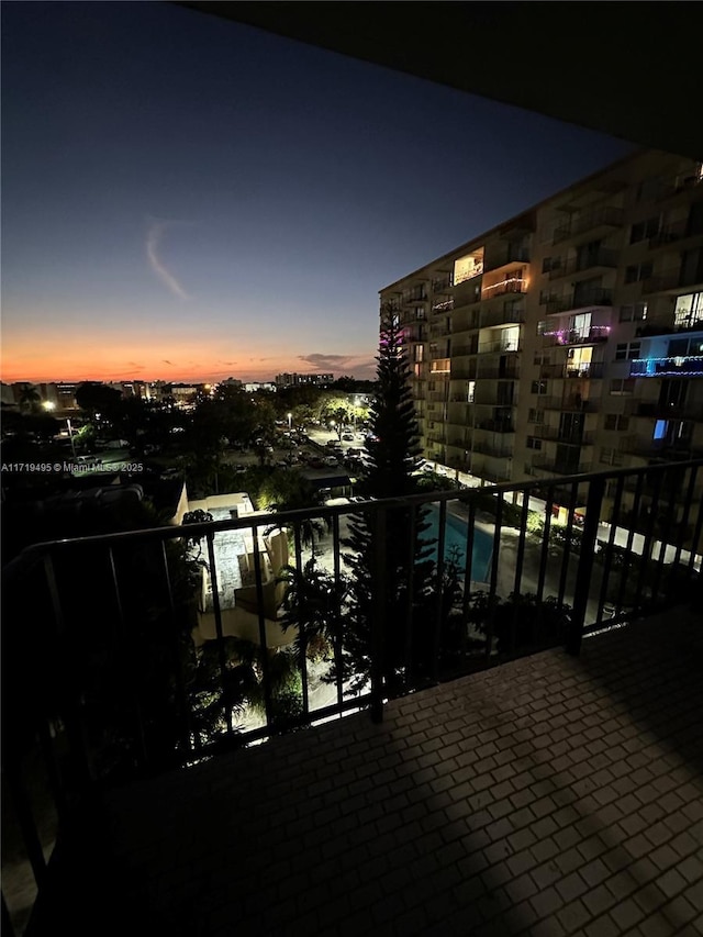 view of balcony at dusk