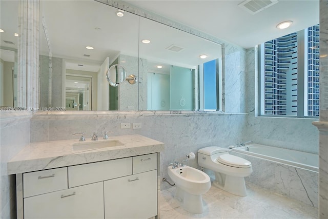 bathroom featuring vanity, a relaxing tiled tub, a bidet, tile walls, and toilet