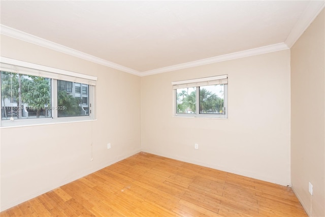 201 Galen Dr Unit 201, Key Biscayne, FL 33149 - empty room with light wood finished floors and crown molding