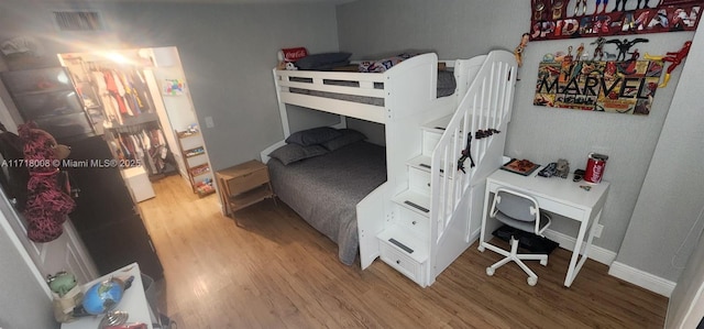 bedroom featuring hardwood / wood-style flooring