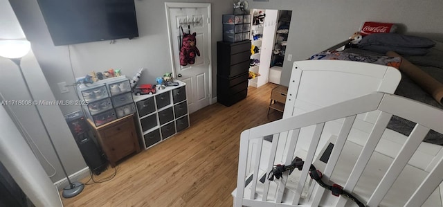 bedroom featuring light hardwood / wood-style flooring