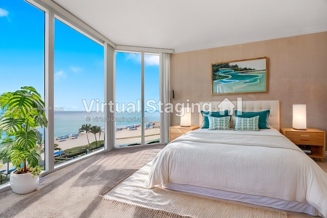 bedroom with ceiling fan with notable chandelier, carpet floors, and ornamental molding