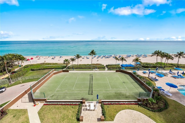 aerial view with a view of the beach and a water view