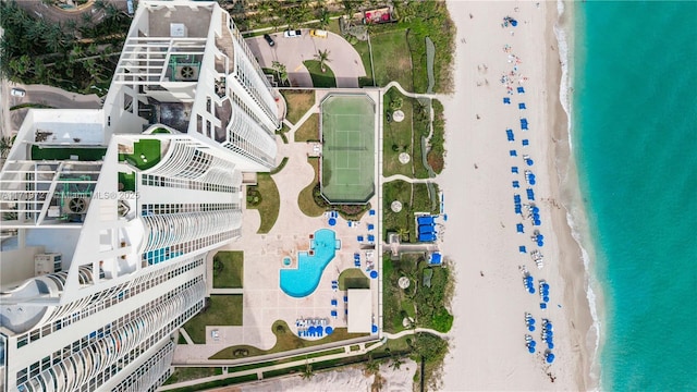 bird's eye view featuring a beach view and a water view