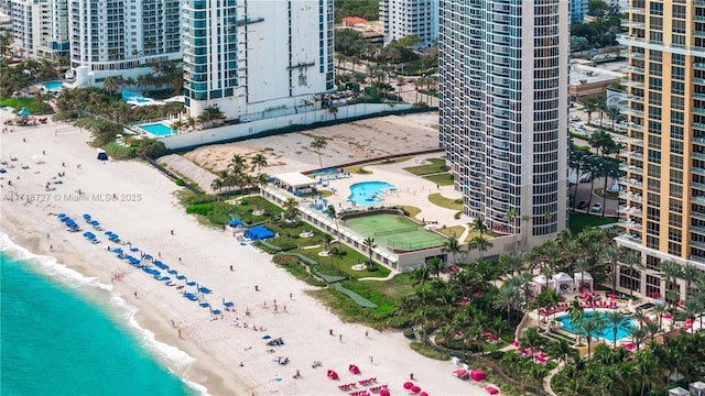 drone / aerial view with a view of the beach and a water view