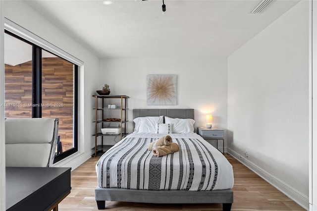 bedroom featuring light hardwood / wood-style flooring