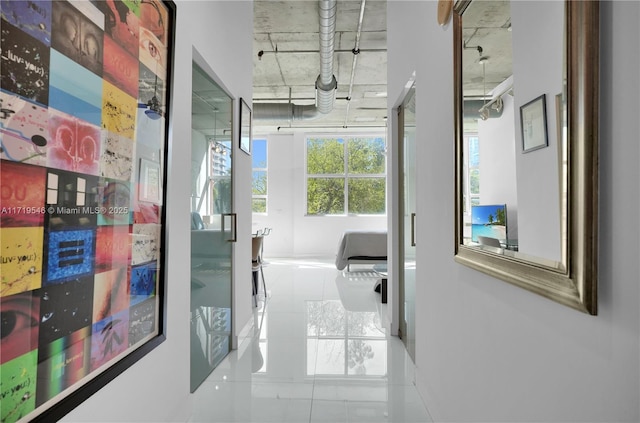 hallway featuring tile patterned floors