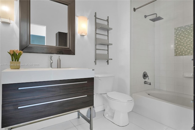 bathroom with tile patterned floors, vanity, toilet, and bathing tub / shower combination