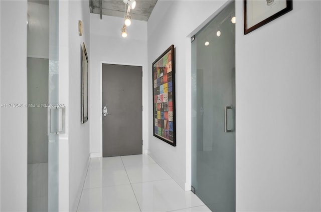 hallway featuring tile patterned floors