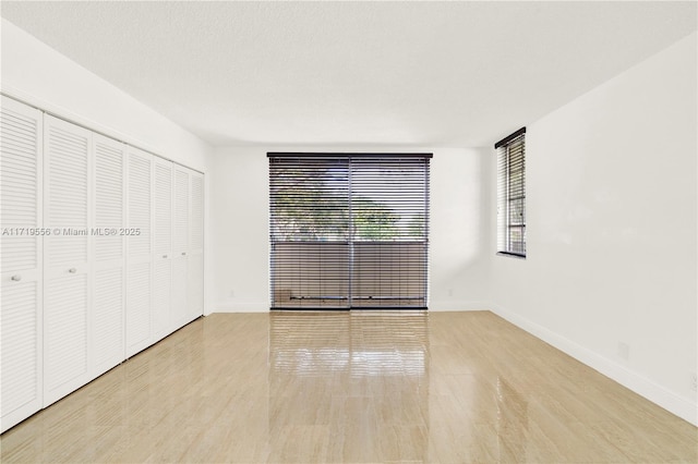 unfurnished bedroom featuring a closet