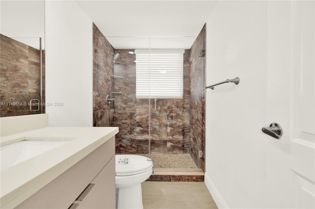 bathroom with tile patterned flooring, vanity, toilet, and walk in shower