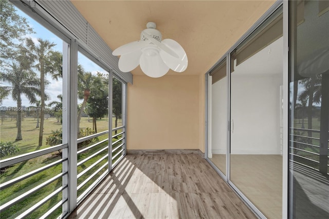 balcony featuring ceiling fan