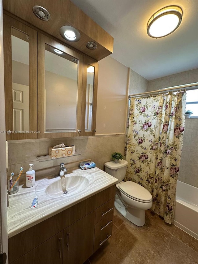 full bathroom with vanity, toilet, and shower / bath combo