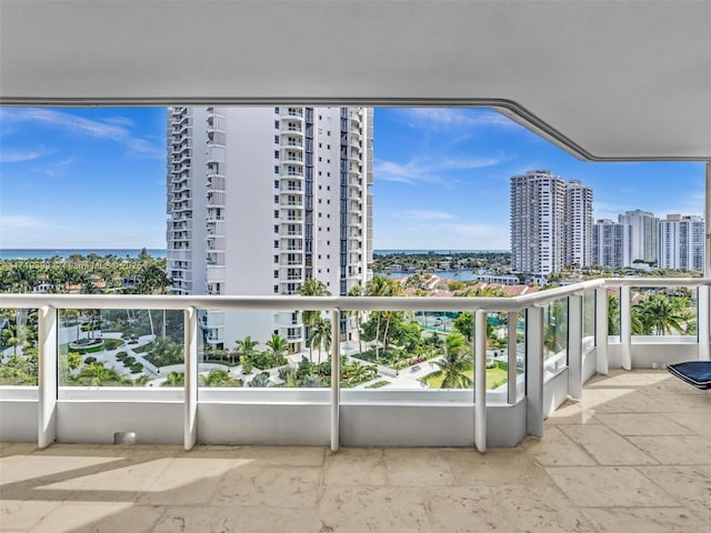 balcony with a city view and a water view