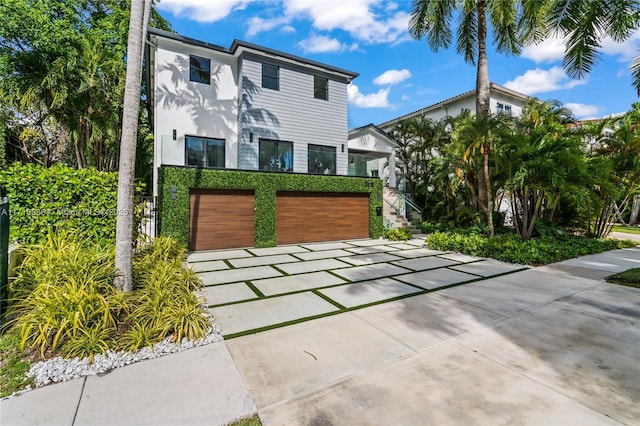 view of front of home with a garage