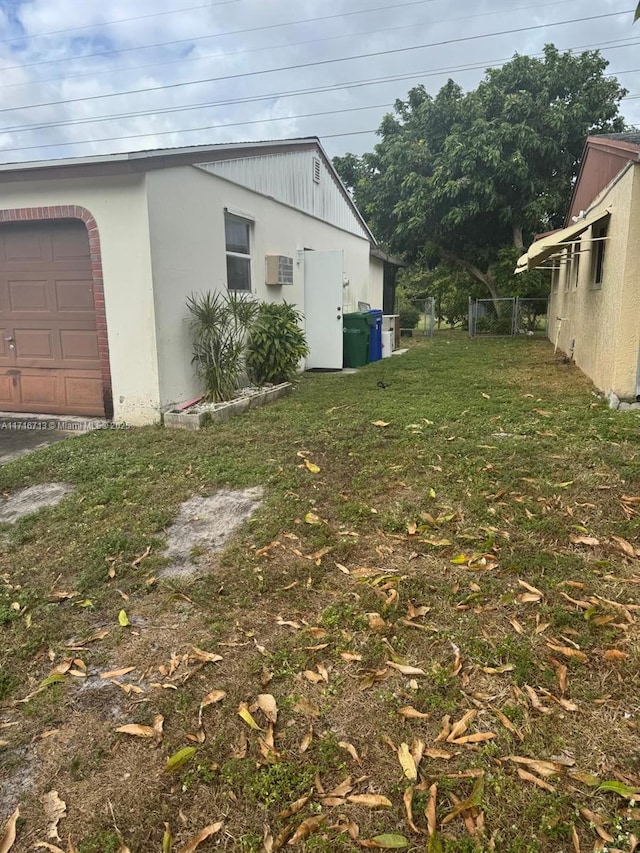 view of yard featuring a garage