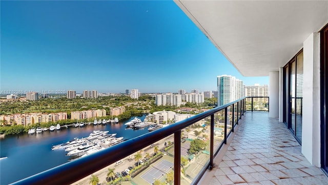 balcony featuring a water view