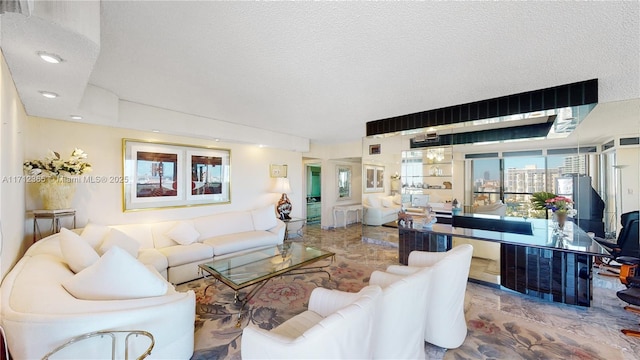 living room featuring a textured ceiling