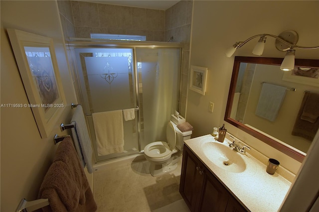 bathroom featuring vanity, toilet, and walk in shower