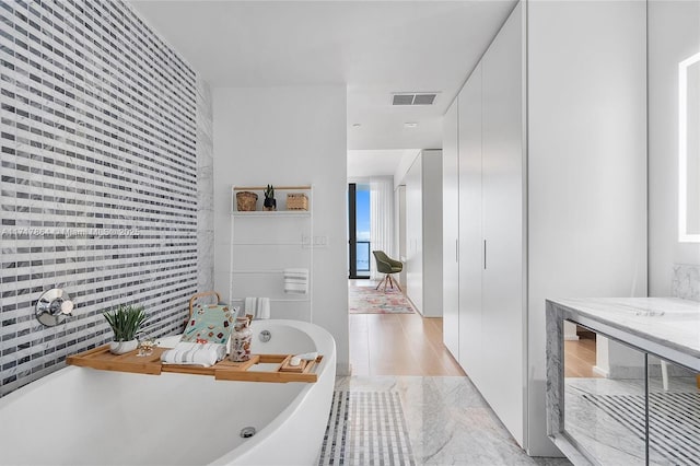 bathroom with a bathing tub