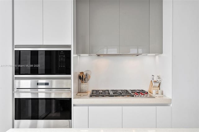 kitchen with white cabinets and stainless steel appliances