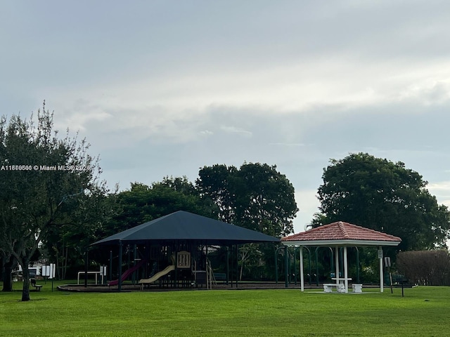 view of community featuring a gazebo, a yard, and a playground