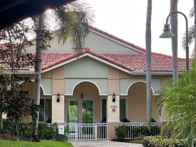 view of front of house featuring french doors