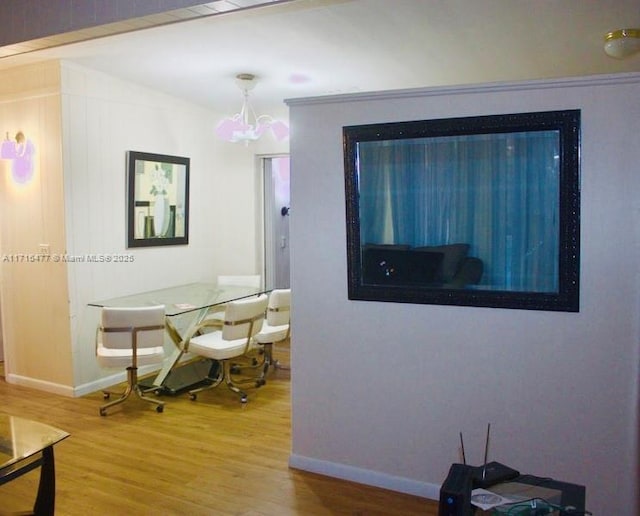 dining area featuring hardwood / wood-style floors