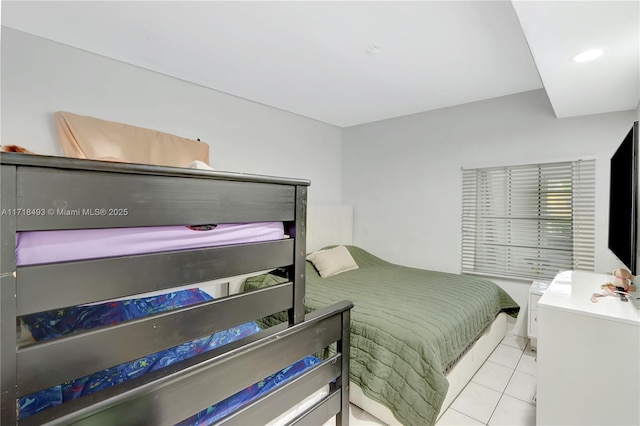 bedroom featuring light tile patterned floors