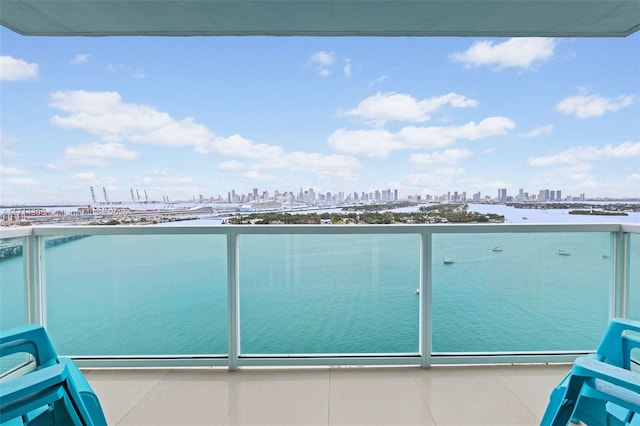 balcony featuring a water view