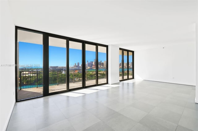 empty room featuring expansive windows