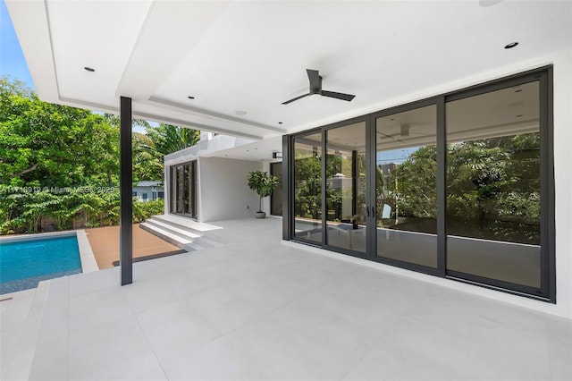 view of patio with ceiling fan