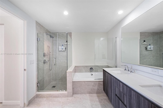 bathroom featuring vanity, tile patterned flooring, and plus walk in shower