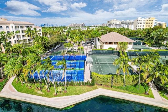 view of pool with tennis court