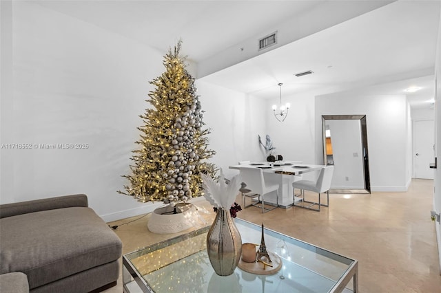 living room featuring a notable chandelier