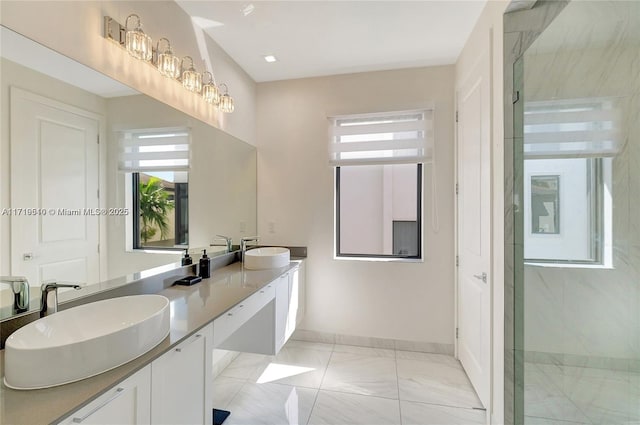 bathroom with vanity and walk in shower