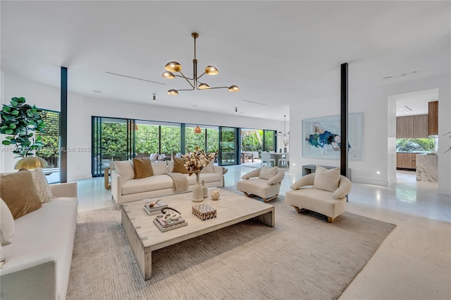 living room featuring a notable chandelier