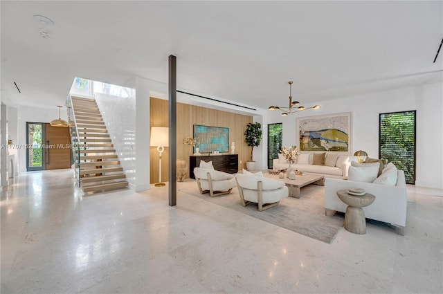 living room featuring an inviting chandelier