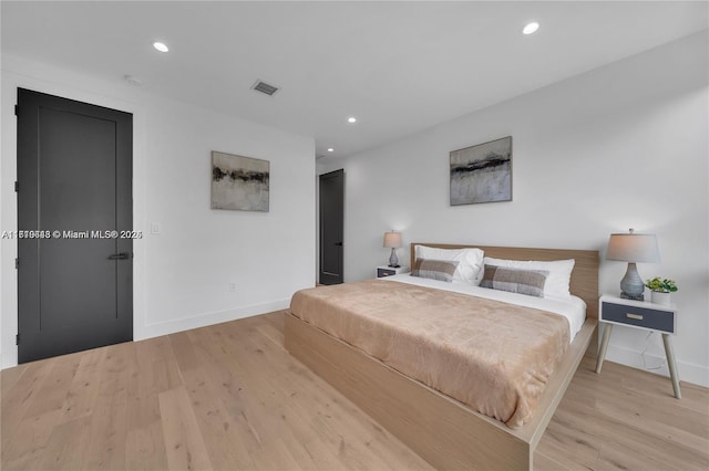 bedroom featuring light hardwood / wood-style flooring