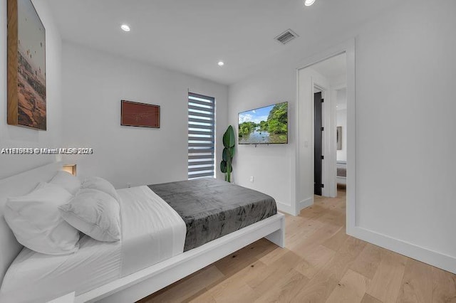 bedroom featuring light wood-type flooring