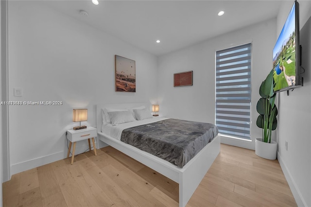 bedroom featuring light wood-type flooring