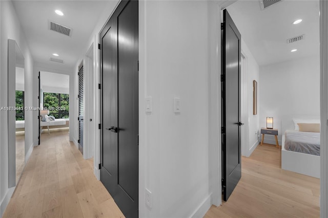 hall featuring light hardwood / wood-style floors