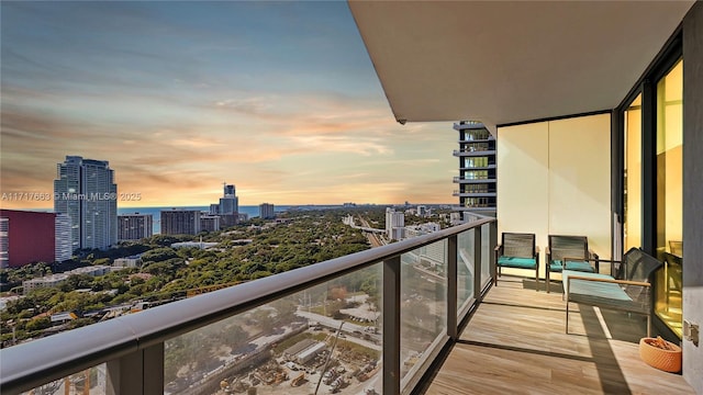 view of balcony at dusk