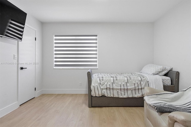 bedroom featuring light hardwood / wood-style flooring