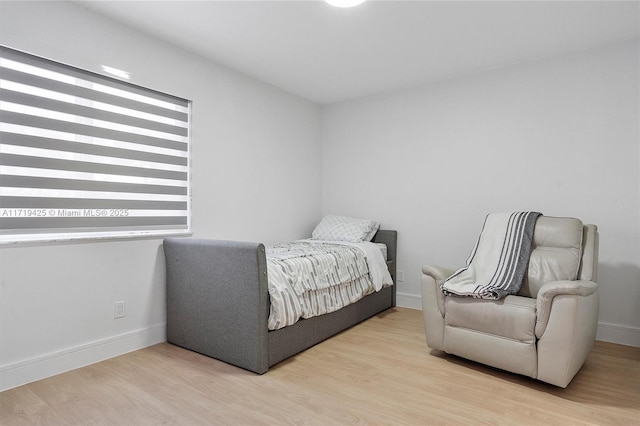 bedroom with light hardwood / wood-style flooring