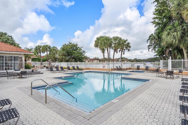 view of swimming pool featuring a patio